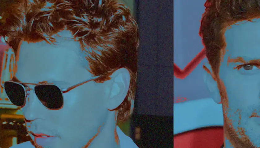 Zwei Männer mit stylischem fasson haarschnitt, einer trägt Sonnenbrille, der andere blickt ernst.