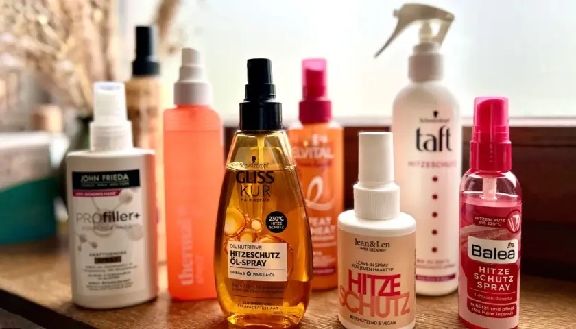 Hitzeschutzsprays von Gliss Kur, Taft, Balea & Co. schützen vor Hitze, nicht wie Haarspray die Haare kaputt machen.