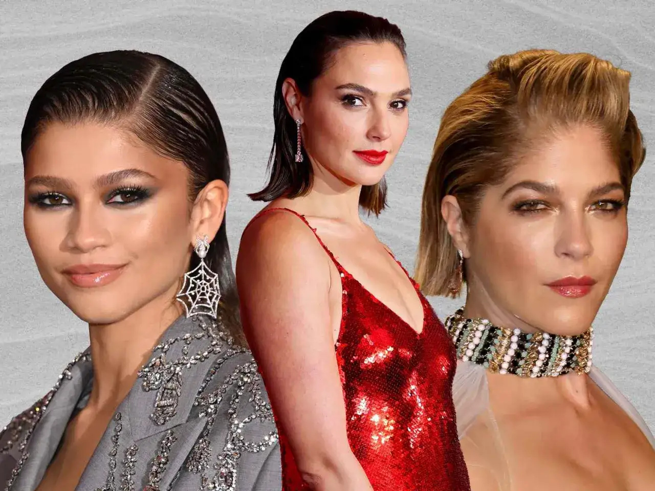 Drei Frauen mit glatten, nassen Frisuren, die an eine Wasserrutsche erinnern. Zendaya trägt Spinnennetz-Ohrringe, Gal Gadot ein rotes Paillettenkleid.